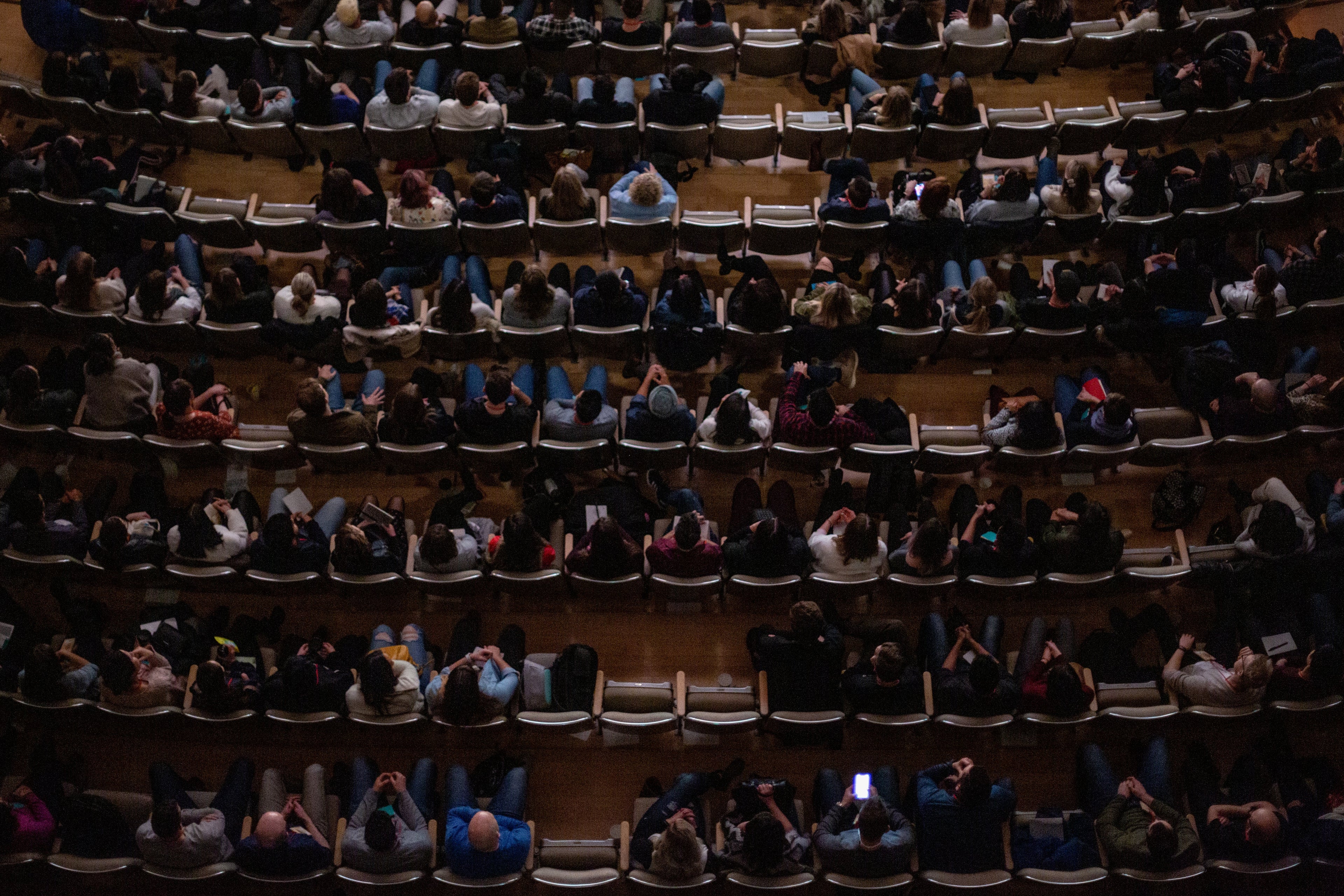 Audience in a theater from an overhead perspective